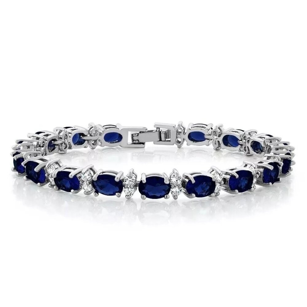 Sterling Silver Deep Blue Oval Gemstone Bracelet with Sparkling Accents